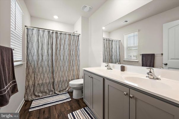 Bathroom, Dual Sink Vanities, Interior, Recessed Lighting, Wood Texture Flooring