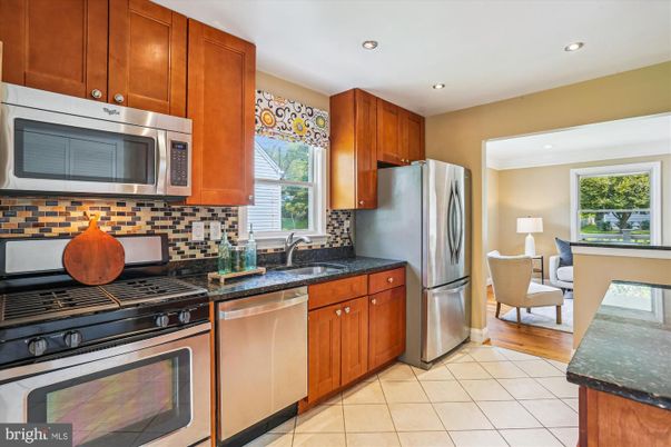 Dining room, Interior, Kitchen, Recessed Lighting, Stainless Steel Appliances, Wood Texture Flooring