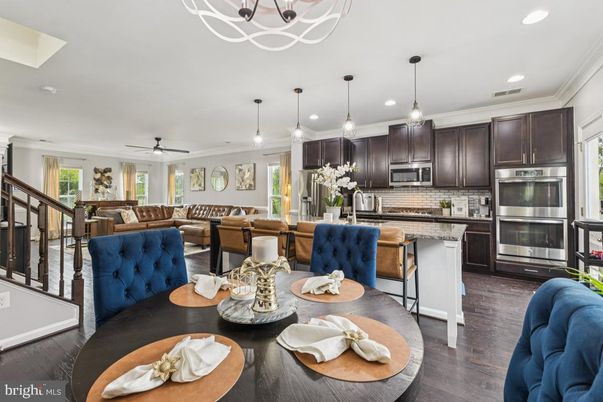 Dining room, Interior, Kitchen, Living room, Pendant Lights, Recessed Lighting, Stainless Steel Appliances, Wood Texture Flooring