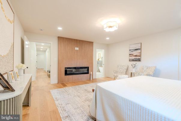 Bedroom, Fireplace, Interior, Recessed Lighting, Wood Texture Flooring