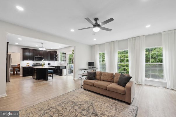 Dining room, Interior, Kitchen, Living room, Recessed Lighting, Stainless Steel Appliances, Wood Texture Flooring