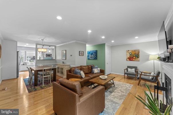 Dining room, Fireplace, Interior, Living room, Pendant Lights, Recessed Lighting, Wood Texture Flooring