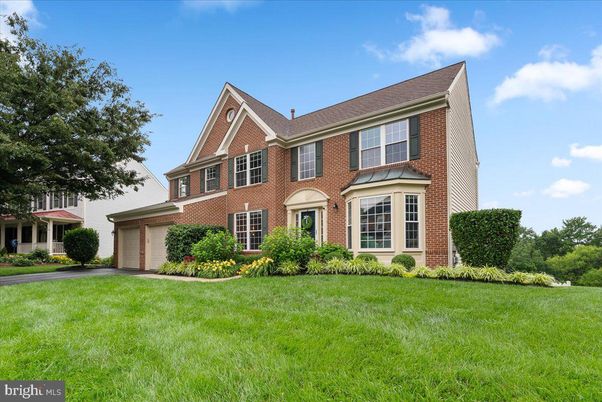 Attached, Backyard, Exterior, Facade, Brick Facade, Brick Traditional