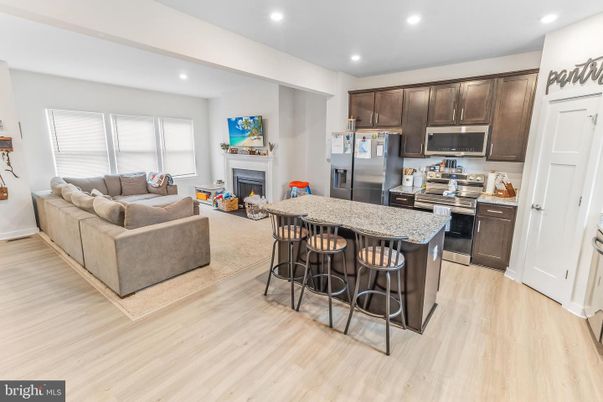 Fireplace, Interior, Kitchen, Living room, Recessed Lighting, Wood Texture Flooring
