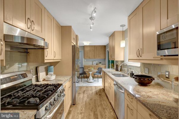 Dining room, Interior, Kitchen, Pendant Lights, Stainless Steel Appliances, Wood Texture Flooring