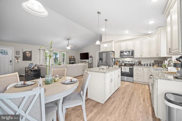Dining room, Interior, Kitchen, Living room, Pendant Lights, Recessed Lighting, Stainless Steel Appliances, Wood Texture Flooring
