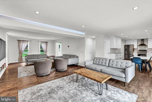 Dining room, Interior, Kitchen, Living room, Recessed Lighting, Stainless Steel Appliances, Wood Texture Flooring