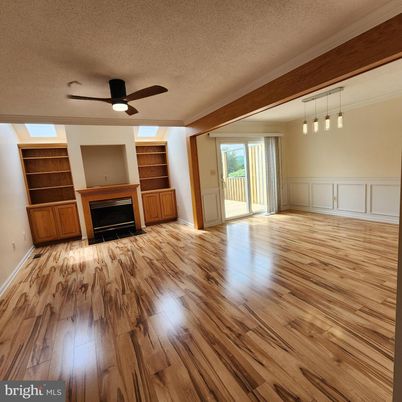 Empty room, Fireplace, Interior, Pendant Lights, Wood Texture Flooring
