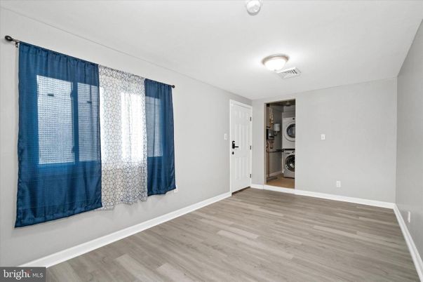 Empty room, Interior, Utility Closets, Washer, Wood Texture Flooring