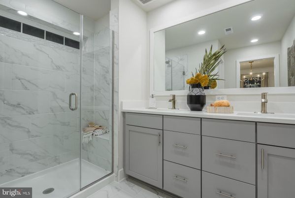 Bathroom, Dual Sink Vanities, Glass Shower, Interior, Marble, Marble Walls, Recessed Lighting