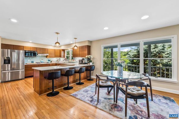 Dining room, Interior, Kitchen, Pendant Lights, Recessed Lighting, Stainless Steel Appliances, Wood Texture Flooring