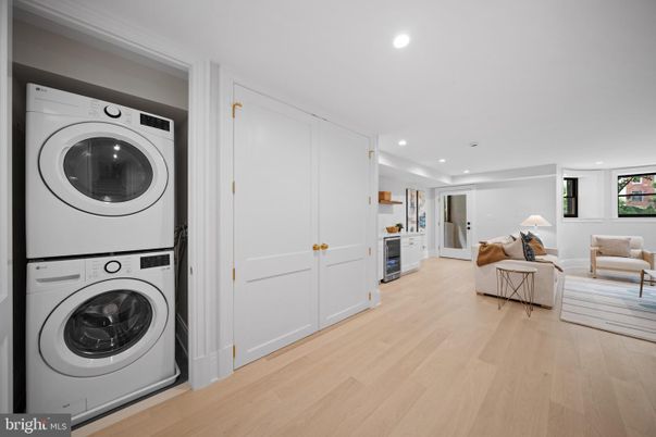 Interior, Living room, Recessed Lighting, Utility Closets, Washer, Wood Texture Flooring