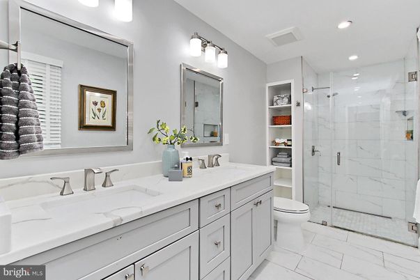 Bathroom, Dual Sink Vanities, Glass Shower, Interior, Marble, Marble Walls, Recessed Lighting