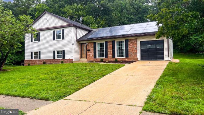 Attached, Exterior, Facade, Brick Facade, Solar Panels, Split Level