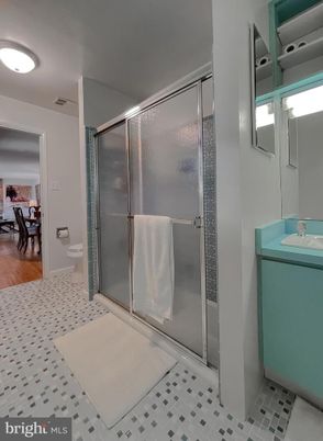 Bathroom, Glass Shower, Interior, Recessed Lighting, Wood Texture Flooring