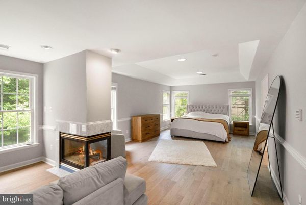 Bedroom, Fireplace, Interior, Recessed Lighting, Wood Texture Flooring