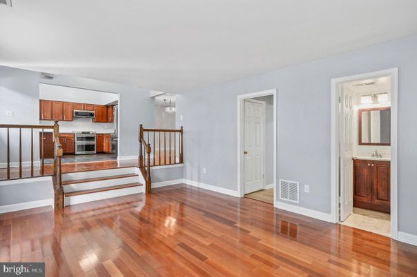 Empty room, Interior, Kitchen, Stainless Steel Appliances, Wood Texture Flooring