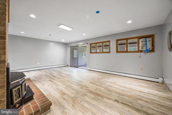 Empty room, Fireplace, Interior, Recessed Lighting, Wood Texture Flooring