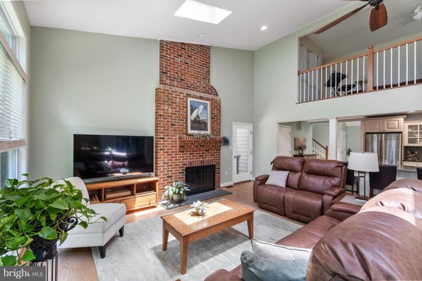 Fireplace, Interior, Kitchen, Living room, Recessed Lighting, Stone Walls, Wood Texture Flooring