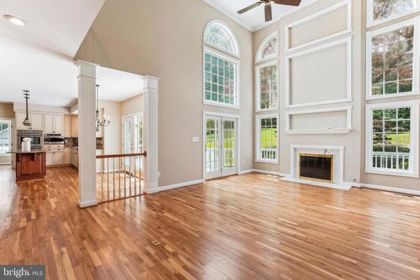 Empty room, Fireplace, Interior, Kitchen, Pendant Lights, Recessed Lighting, Wood Texture Flooring
