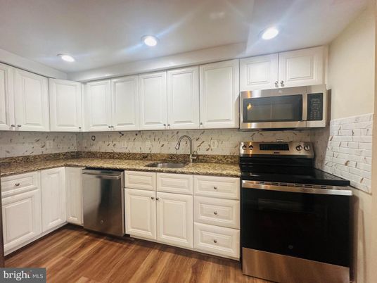Interior, Kitchen, Recessed Lighting, Stainless Steel Appliances, Wood Texture Flooring