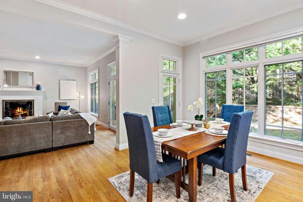 Dining room, Fireplace, Interior, Living room, Recessed Lighting, Wood Texture Flooring