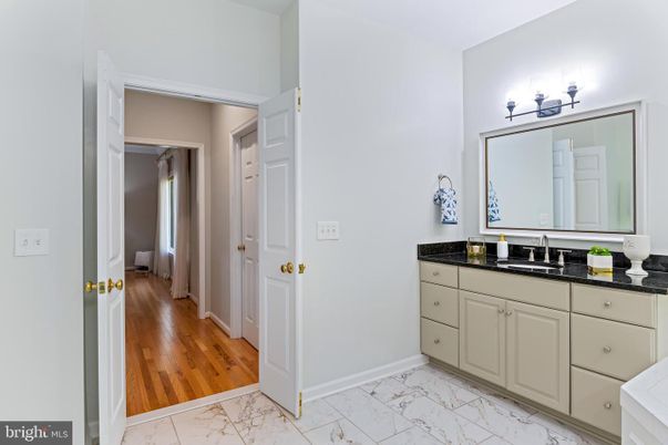 Bathroom, Dual Sink Vanities, Interior, Marble, Wood Texture Flooring