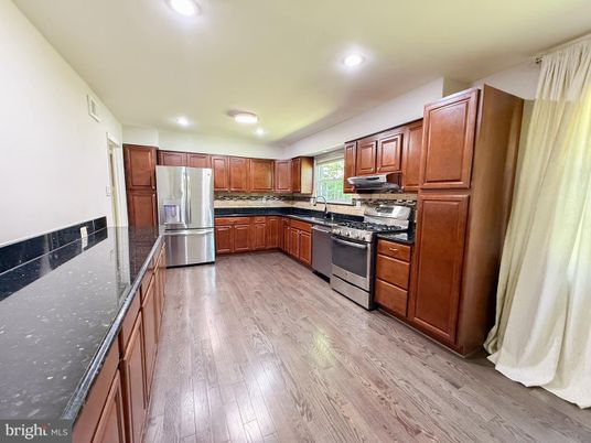 Interior, Kitchen, Recessed Lighting, Stainless Steel Appliances, Wood Texture Flooring
