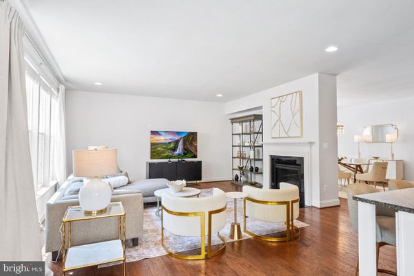 Dining room, Fireplace, Interior, Living room, Recessed Lighting, Wood Texture Flooring