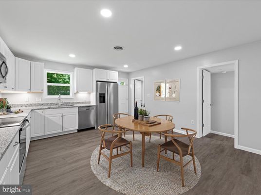 Dining room, Interior, Kitchen, Recessed Lighting, Stainless Steel Appliances, Wood Texture Flooring