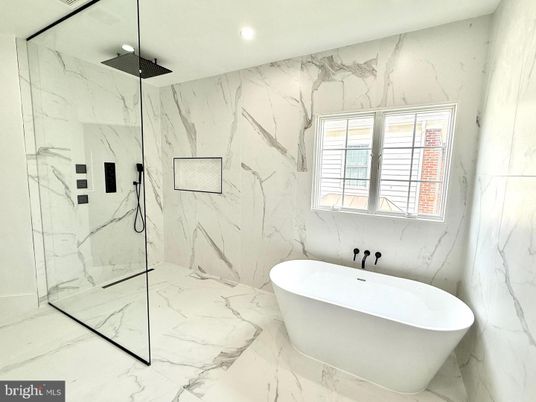 Bathroom, Free Standing Baths, Glass Shower, Interior, Marble, Marble Walls, Recessed Lighting