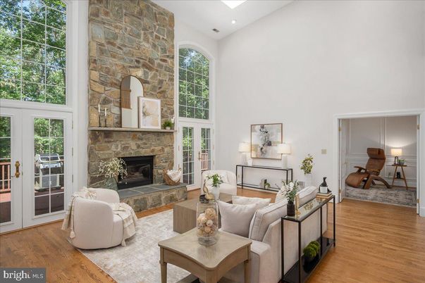 Fireplace, Interior, Living room, Recessed Lighting, Stone Walls, Wood Texture Flooring