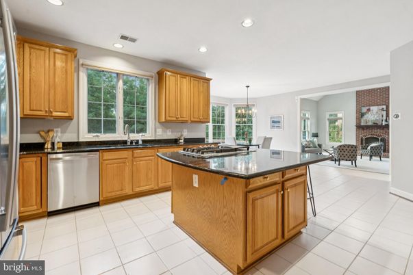 Dining room, Fireplace, Interior, Kitchen, Pendant Lights, Recessed Lighting, Stainless Steel Appliances