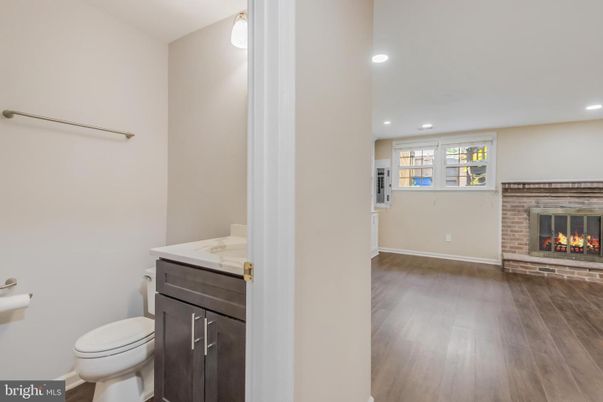 Bathroom, Fireplace, Interior, Recessed Lighting, Wood Texture Flooring