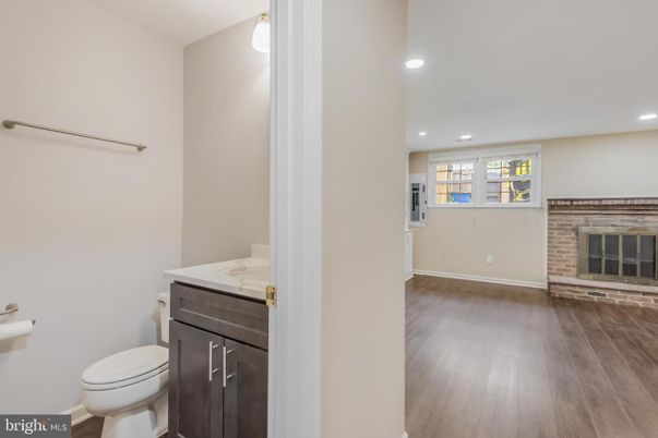 Bathroom, Fireplace, Interior, Recessed Lighting, Wood Texture Flooring
