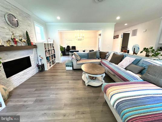 Chandelier, Fireplace, Interior, Living room, Recessed Lighting, Wood Texture Flooring