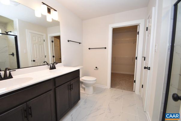 Bathroom, Dual Sink Vanities, Interior, Marble, Marble Walls, Walk-in Closets