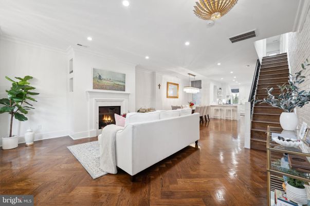 Dining room, Fireplace, Interior, Living room, Pendant Lights, Recessed Lighting, Wood Texture Flooring