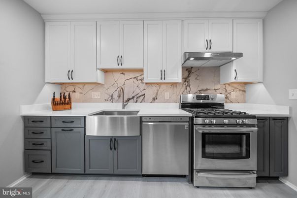 Interior, Kitchen, Marble Walls, Stainless Steel Appliances, Wood Texture Flooring