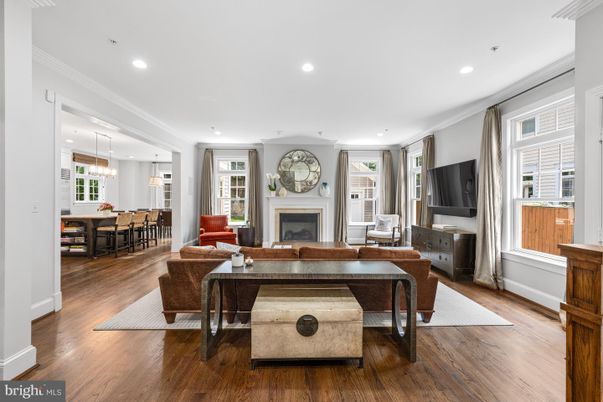 Dining room, Fireplace, Interior, Living room, Pendant Lights, Recessed Lighting, Wood Texture Flooring