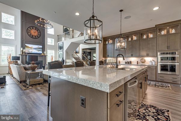 Fireplace, Interior, Kitchen, Living room, Pendant Lights, Recessed Lighting, Stainless Steel Appliances, Wood Texture Flooring