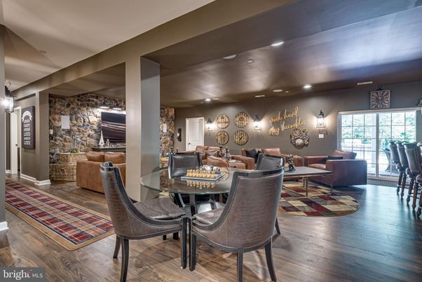 Dining room, Interior, Living room, Recessed Lighting, Stone Walls, Wood Texture Flooring