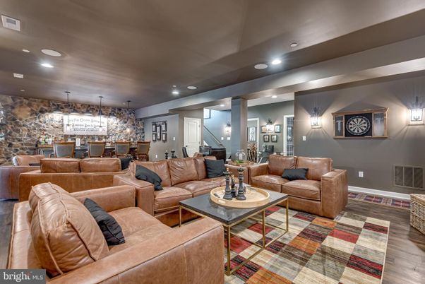 Dining room, Interior, Living room, Pendant Lights, Recessed Lighting, Stone Walls, Wood Texture Flooring