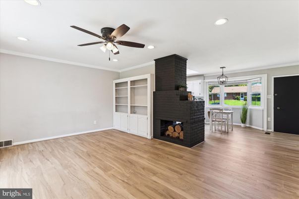 Dining room, Fireplace, Interior, Pendant Lights, Recessed Lighting, Wood Texture Flooring