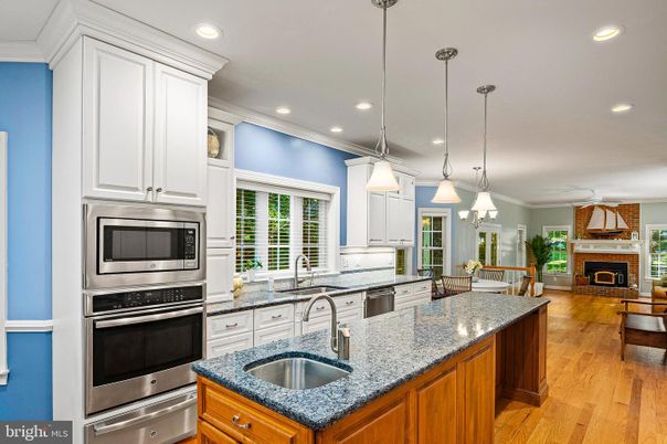 Fireplace, Interior, Kitchen, Pendant Lights, Recessed Lighting, Stainless Steel Appliances, Wood Texture Flooring
