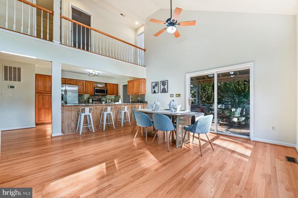 Dining room, Interior, Kitchen, Recessed Lighting, Stainless Steel Appliances, Wood Texture Flooring