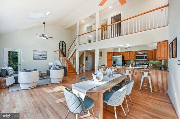 Dining room, Interior, Kitchen, Living room, Recessed Lighting, Stainless Steel Appliances, Wood Texture Flooring
