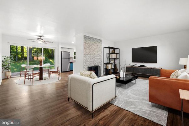 Dining room, Fireplace, Interior, Living room, Recessed Lighting, Wood Texture Flooring