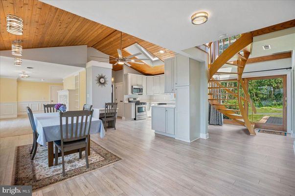 Dining room, Interior, Kitchen, Pendant Lights, Recessed Lighting, Stainless Steel Appliances, Wooden Ceilings, Wood Texture Flooring
