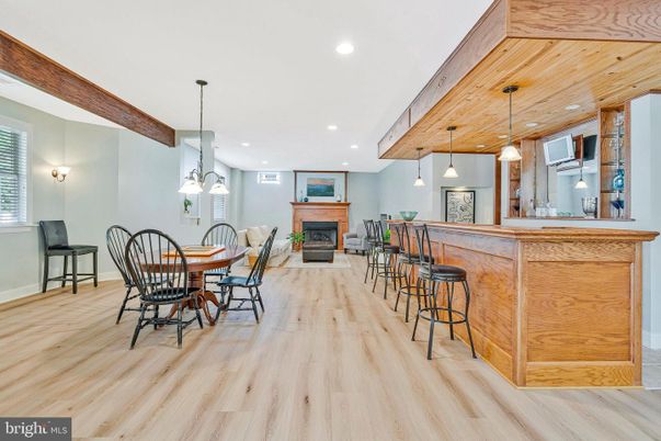 Dining room, Fireplace, Interior, Pendant Lights, Recessed Lighting, Wooden Ceilings, Wood Texture Flooring